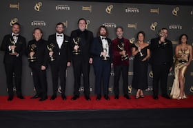 From left, Brian J. Armstrong, Benjamin Cook, James Gallivan, John Creed, Mark Hailstone, Ken Cain, Melissa Muik, Matt Salib and Sanaa Kelley pose with a sound editing award for “Shogun” at the Creative Arts Emmy Awards on Sunday.