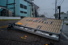 Signage is strewn across an intersection in Houma, La., after Francine swept through the area on Wednesday.