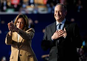 Vice President Kamala Harris and second gentleman Doug Emhoff react as they attend the Democratic National Convention in Chicago on Monday. (Craig Hudson/Reuters)