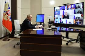 Russian President Vladimir Putin holds a meeting via video link Friday outside Moscow with members of the Security Council.