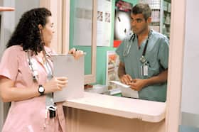 Julianna Margulies and George Clooney in Season 3 of “ER.”