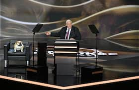 West Virginia Gov. Jim Justice and Babydog onstage during the Republican National Convention in Milwaukee on July 16.